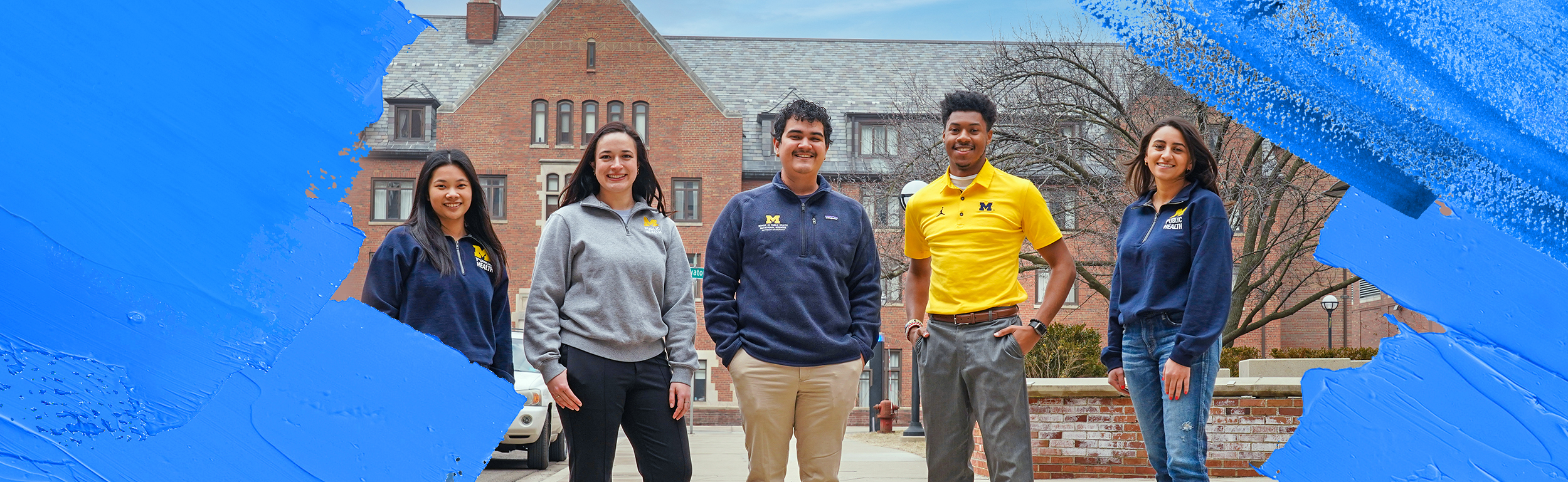 students in front of school building
