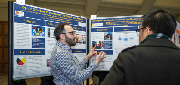 Abe Salih presenting his research poster