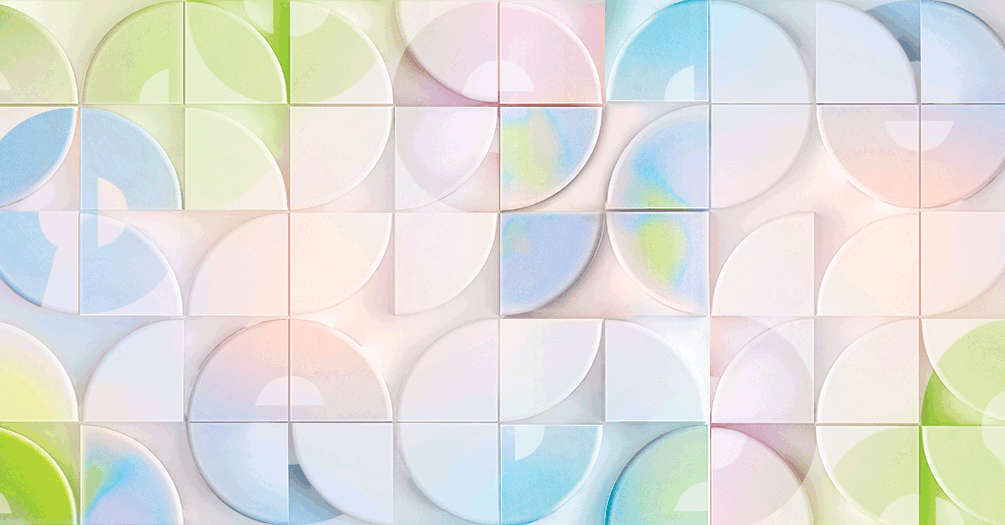 Moving puzzle pieces that form blue, green and pink globes and a globe that looks like earth