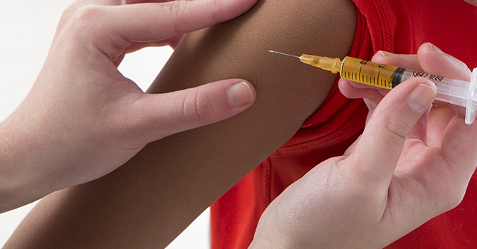 Child being vaccinated