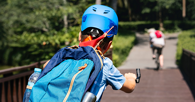 child riding bicycle