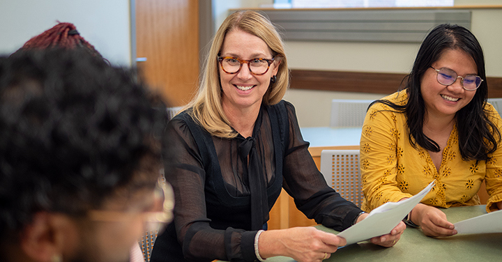 Denise Anthony with students