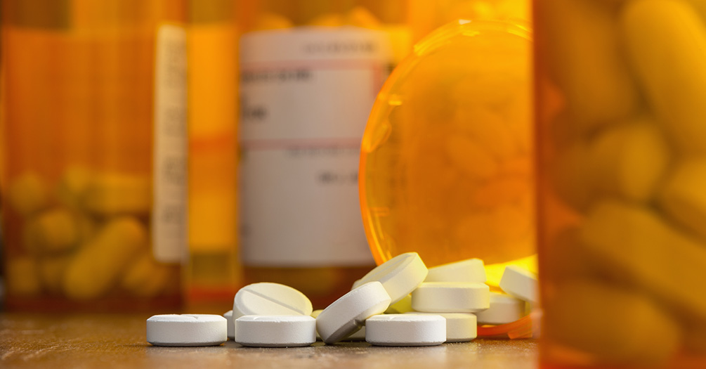 Different types of medications on a surface.