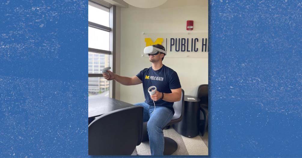 University of Michigan Public Health student using virtual reality headset for educational training