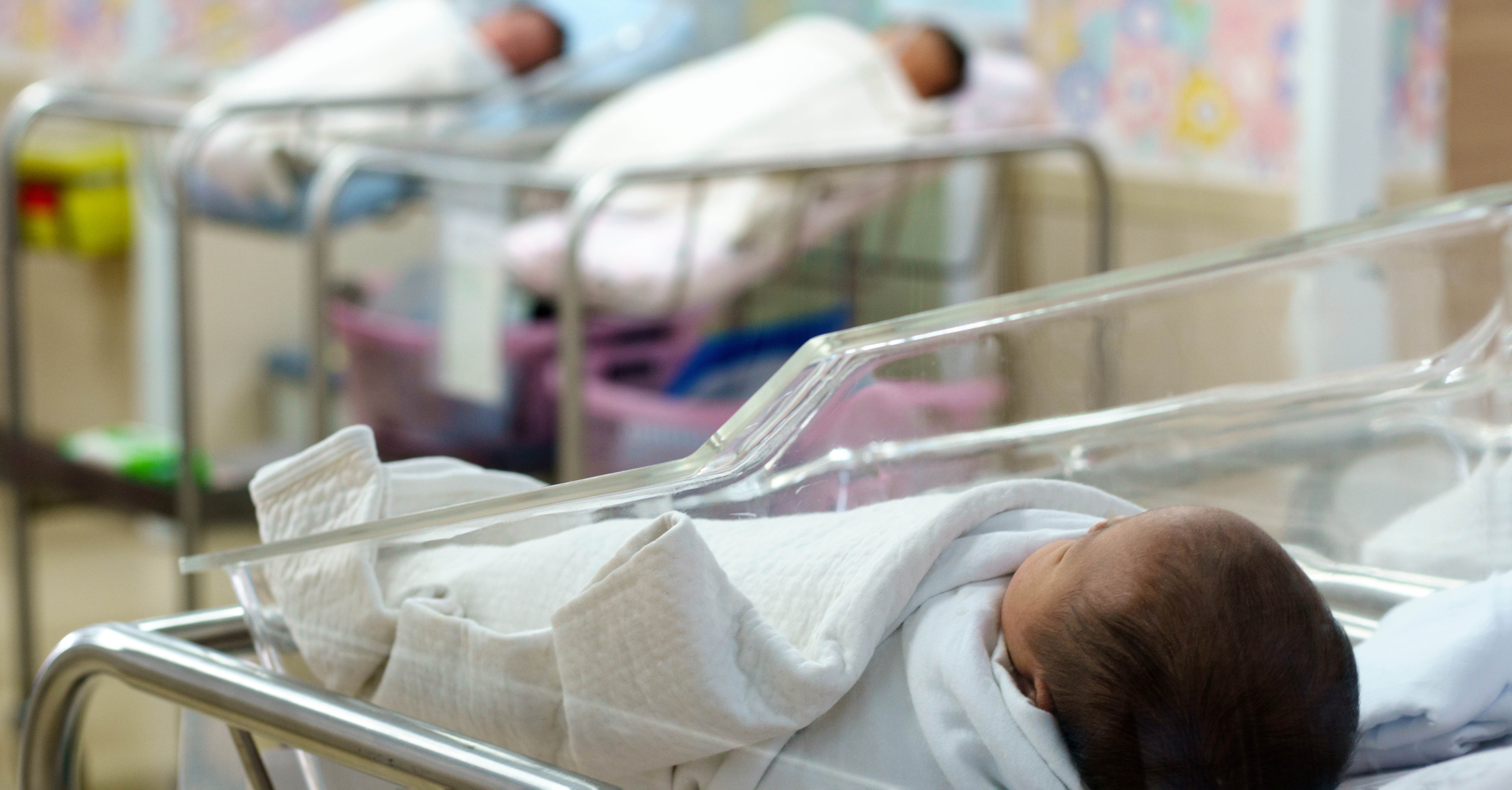 Infant in a hospital nursery.