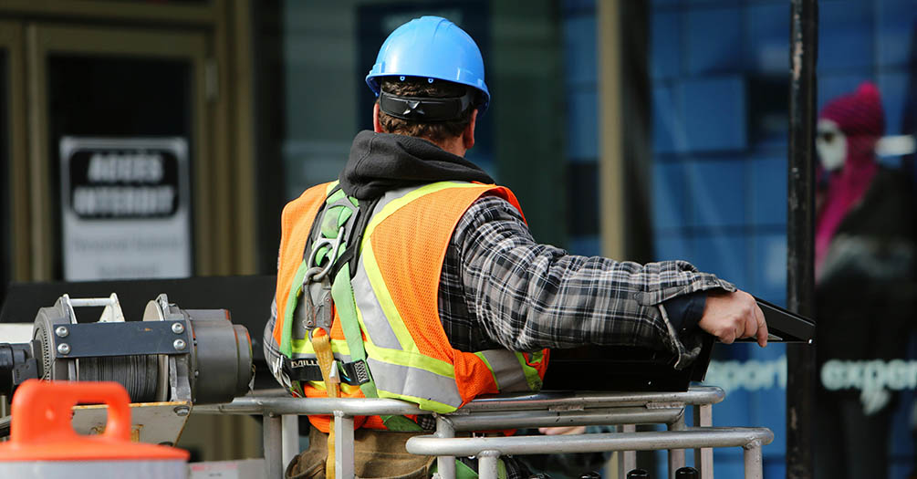 A construction worker wearing a hard hat.
