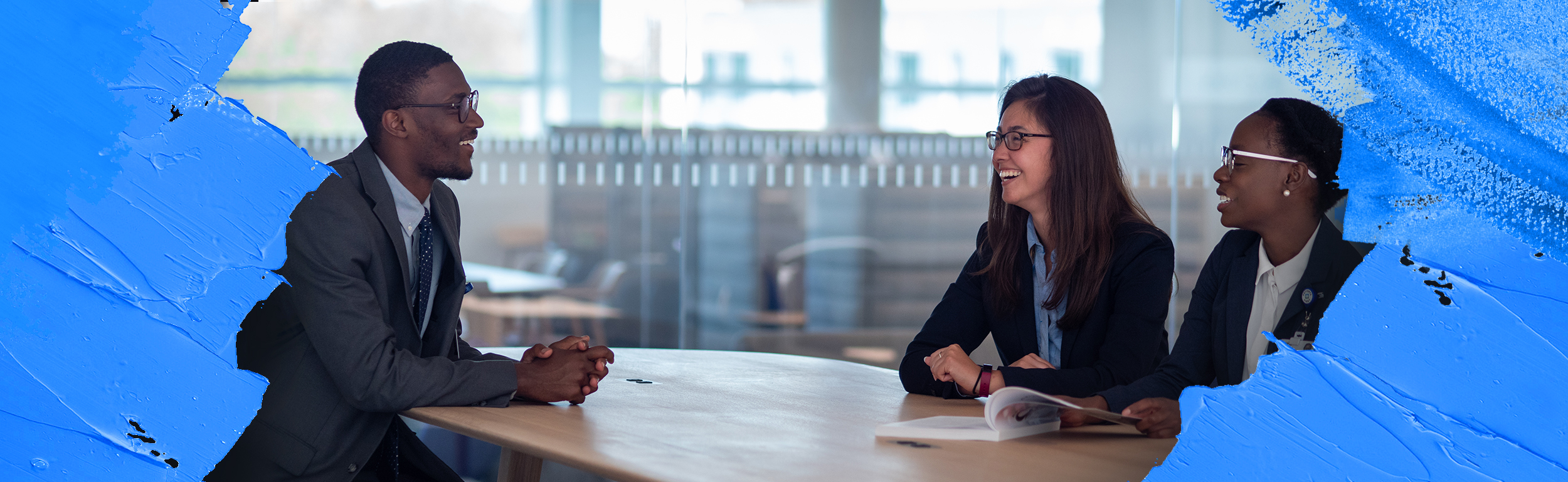 Students talking around the table