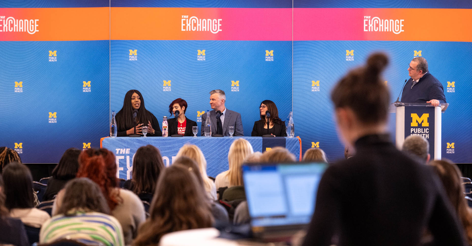 A group of panelists in discussion. Panelists, from left to right, Adaora Ezike, Celeste Kanpurwala, Douglas Wiebe, April Zeoli and moderator Patrick Carter.