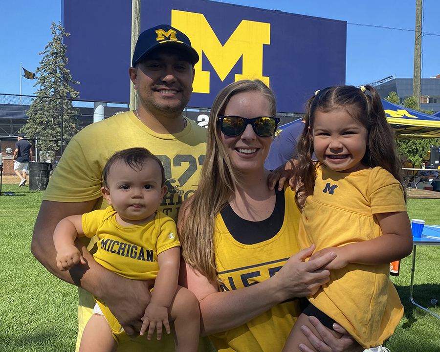 Katie Romas with her family at Michigan Stadium.