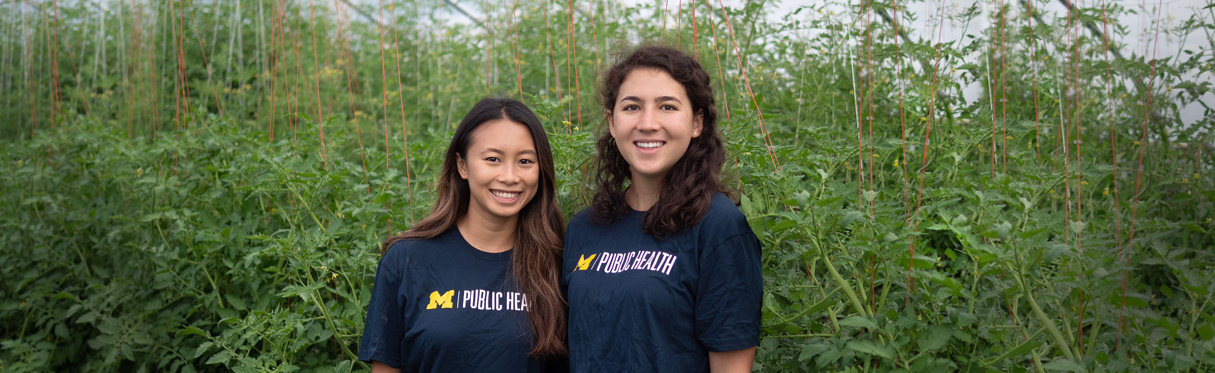 undergraduate students at campus farm